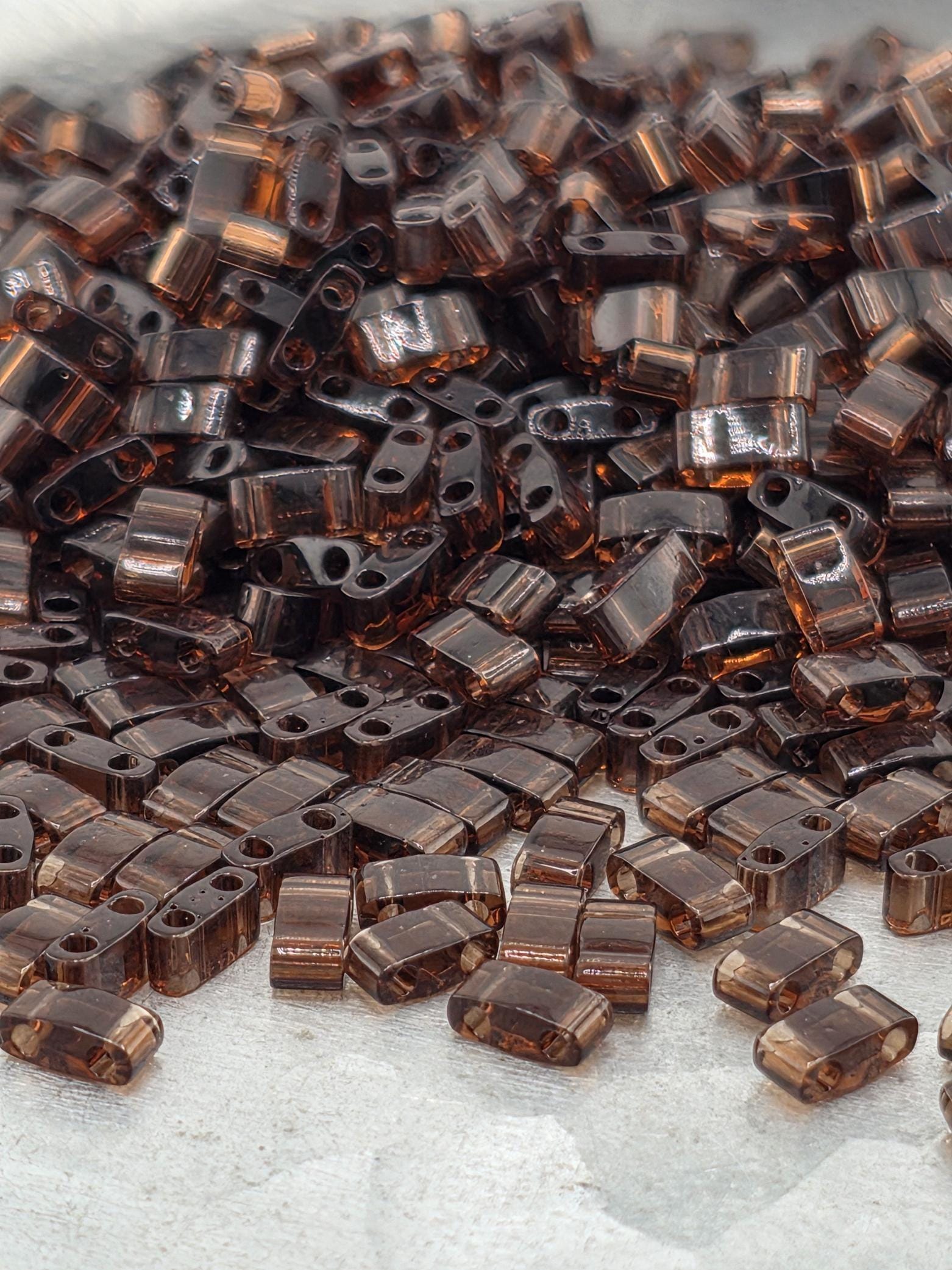 HTL0135-Miyuki Half-TIla Beads:PlumT (7.5g pkg)