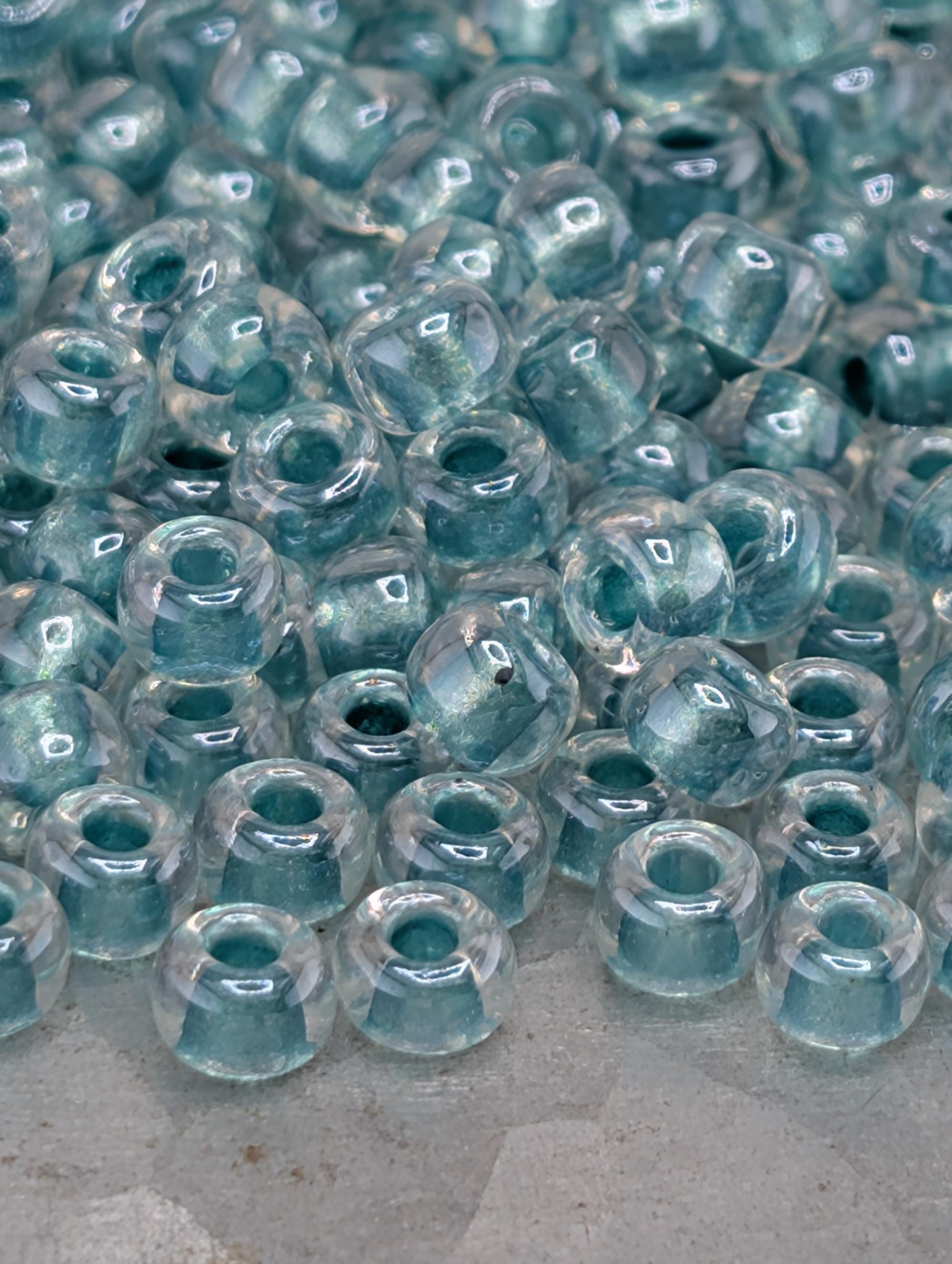 6-1528:Crystal/Aqua ICL*-Miyuki Rocaille 6/0 (20g pkg ~240 pcs)