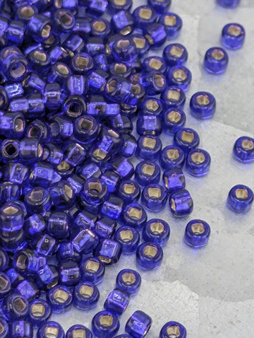 Miyuki Rocailles Beads: Translucent Royal Purple - Silver Lined, 11/0 Size