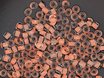 Matsuno Seed Beads Size 6 - Translucent Tangerine, 15g Pack