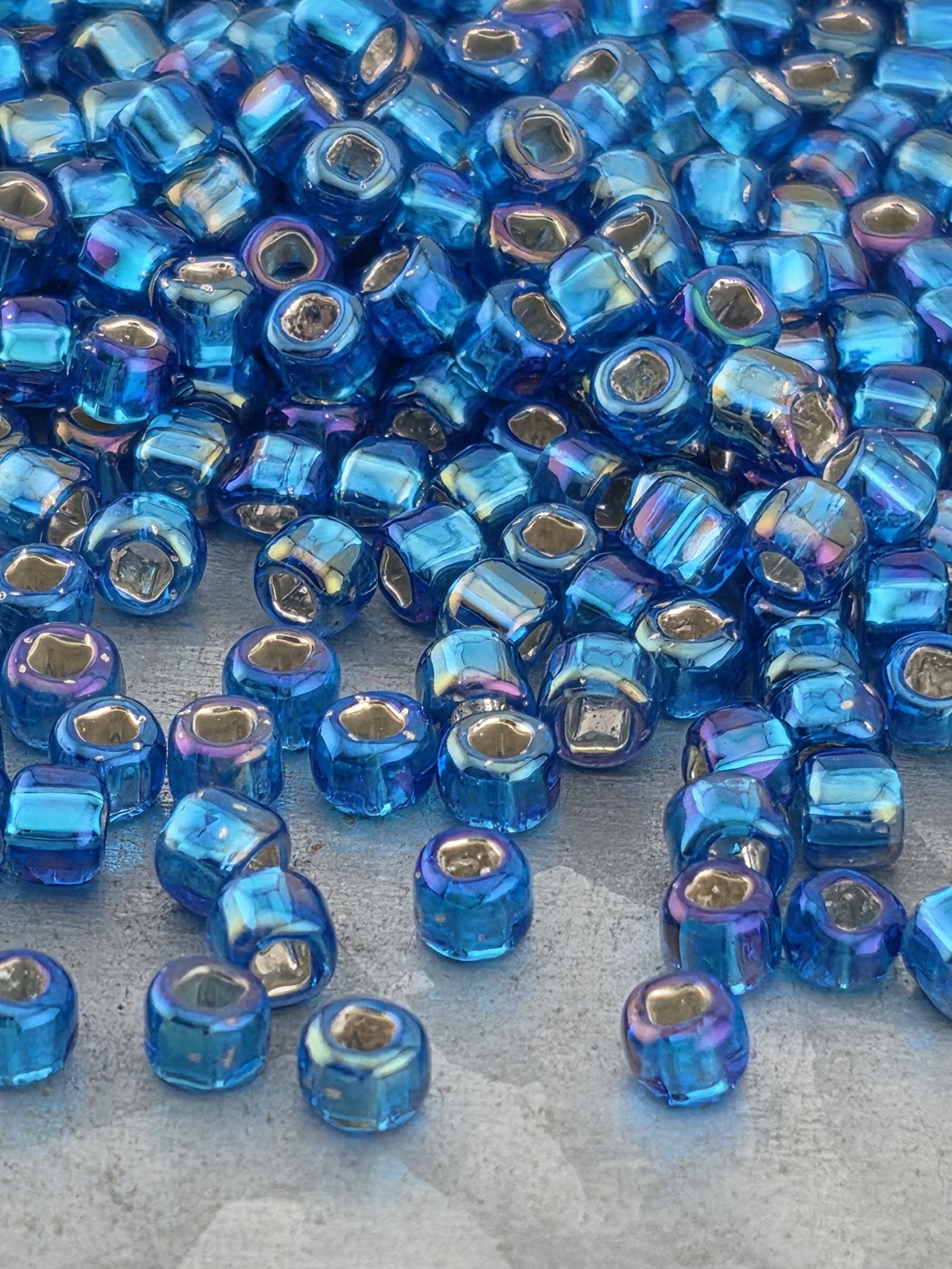 Matsuno Seed Beads Size 6: Turquoise Blue, Silver-Lined Rainbow, 15g Pack