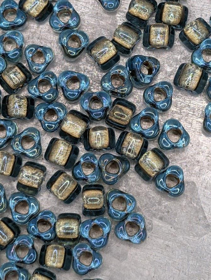 Blue/Bronze Inside Color Lined Sparkle Miyuki Triangle Size 8/0 (15g Pkg)