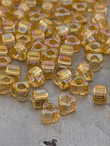 Light Gold Translucent Rainbow Miyuki Triangle Size 5/0 (15g Pkg)
