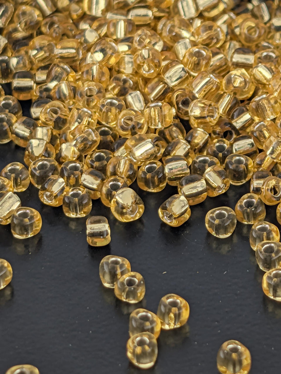 Gold Translucent Silver Lined Miyuki Triangle Size 8/0 (15g Pkg)