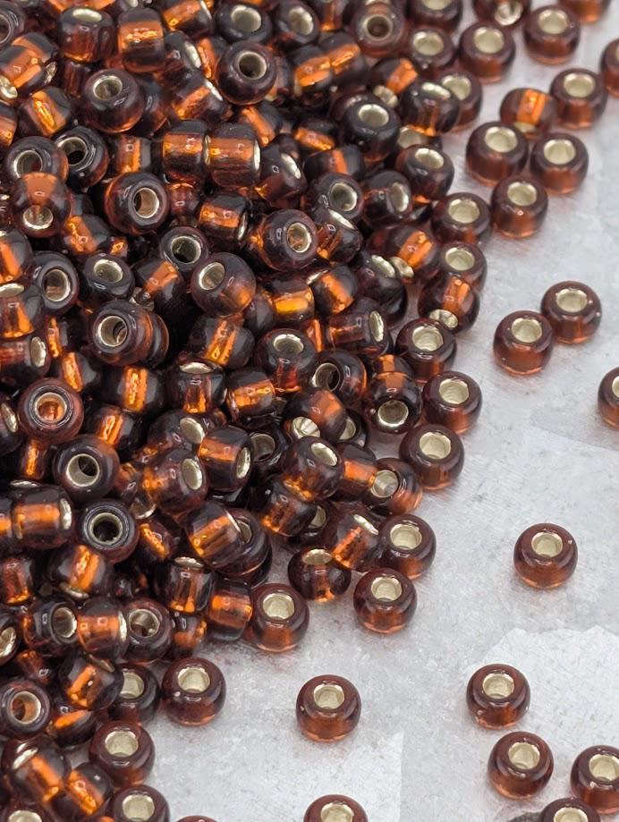 Dark Topaz Translucent Silver Lined Miyuki Rocaille Size 8/0 (20g pkg)