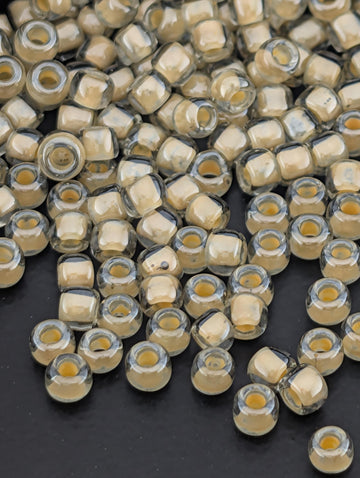 Inside-Color Black Diamond/Orange Creme-Lined Size 8/0 Toho Round 2.5" tube