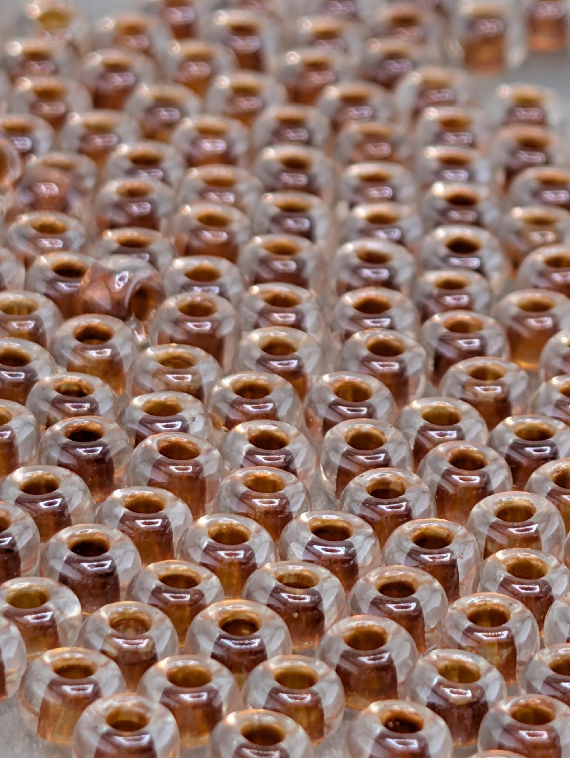 6-1551:Crystal/Burnt Orange ICL*-Miyuki Rocaille 6/0 (20g pkg ~240 pcs)