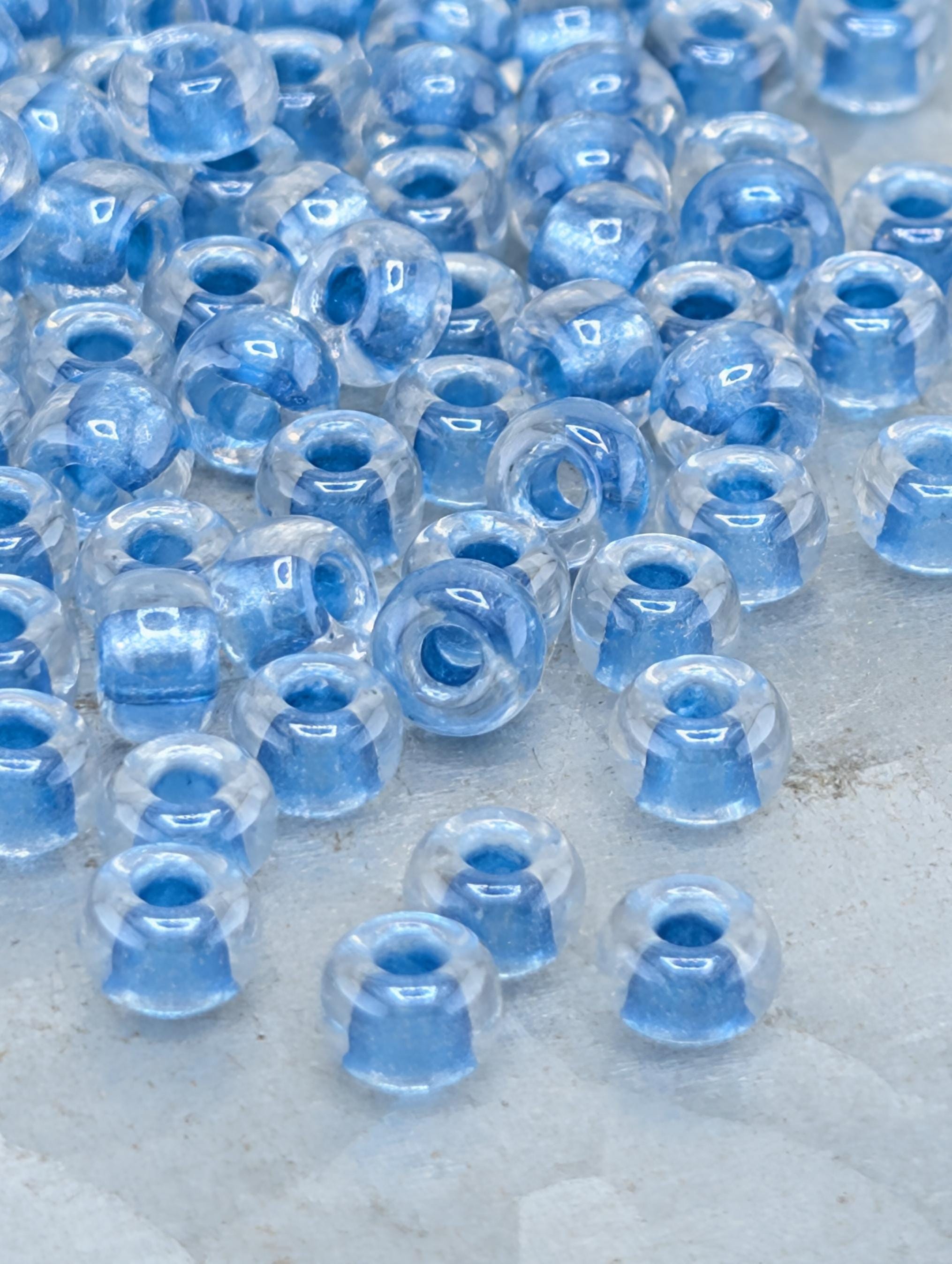 6-1529:Crystal/Med Blue ICL*-Miyuki Rocaille 6/0 (20g pkg ~240 pcs)