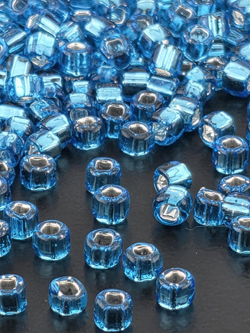 Matsuno Seed Beads: Translucent Aqua with Silver Lining - Square Hole, 15g