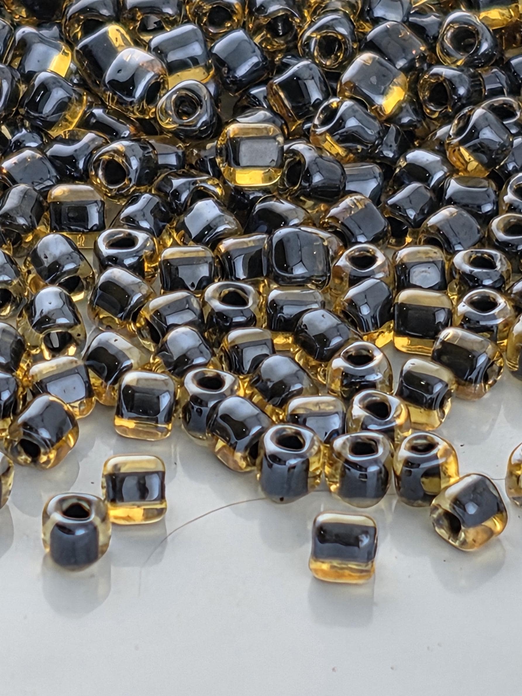 Amber/Black Inside Color Lined Miyuki Triangle Size 10/0 (15g Pkg) | Japanese Seed Beads | Bead Weaving Embroidery Supply | DIY Jewelry