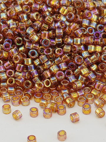 DB0170:Amber Translucent Rainbow Miyuki Delica (Size 11, 7 grams, ~1400 beads)