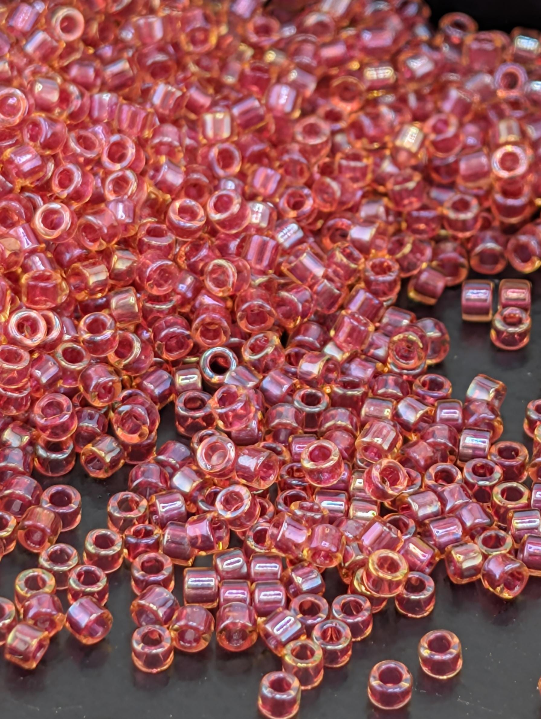 DB0062:Light Cranberry Lined Topaz Luster Miyuki Delica (Size 11, 7 grams, ~1400 beads)