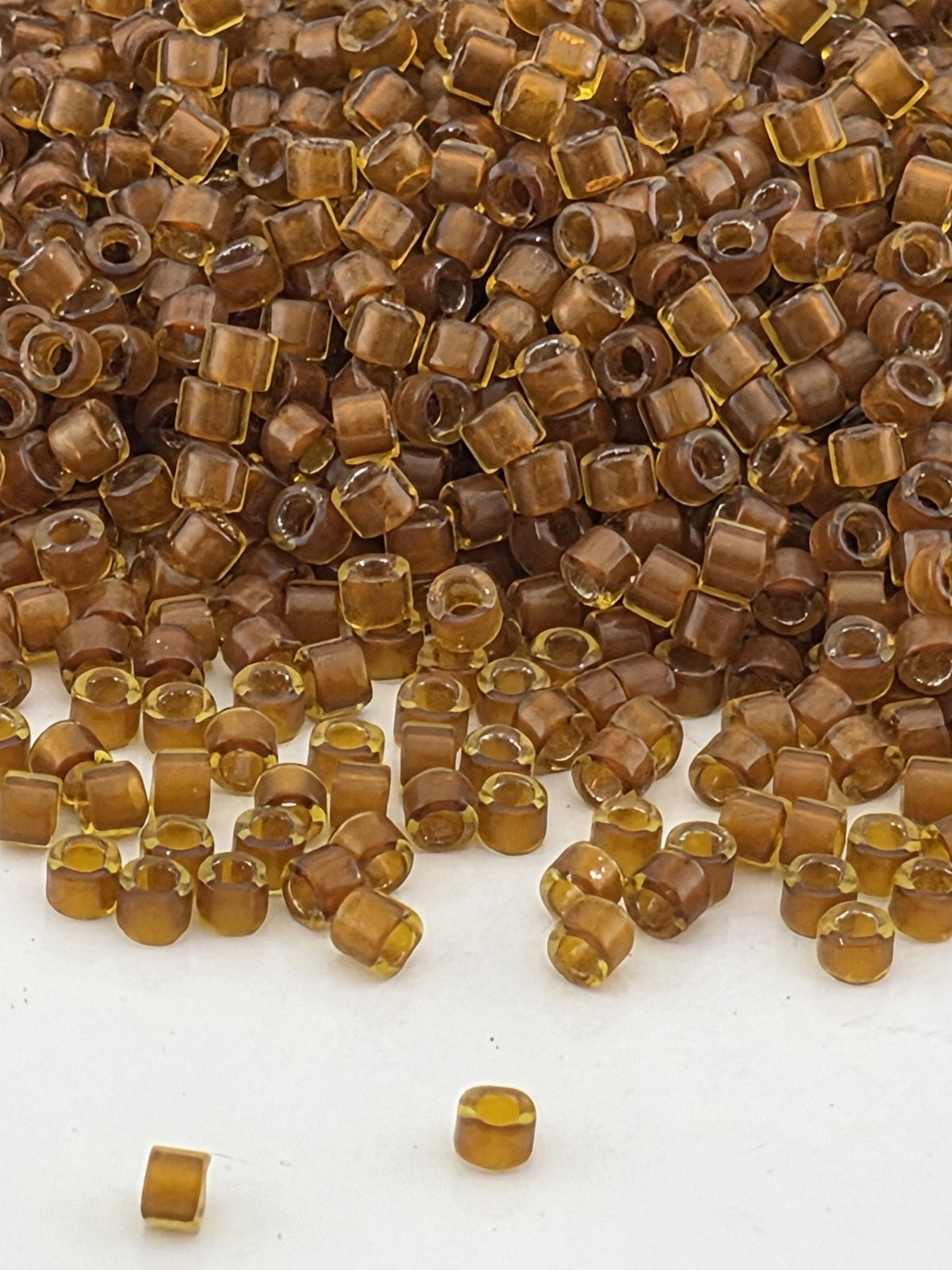 DB1391:Peridot/Bronze Inside Color Lined Sparkle Miyuki Delica (Size 11, 7 grams, ~1400 beads)