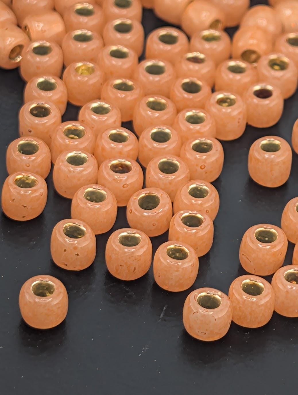 Toho Japanese Seed Beads: 6/0 Round Translucent Silver Lined Grapefruit - 2.5" Tube ~8-9g