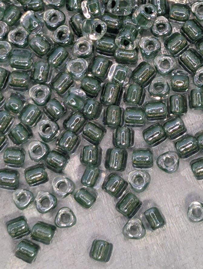 Crystal/Hunter Green Inside Color Lined Sparkle Miyuki Triangle Size 8/0 (15g Pkg)