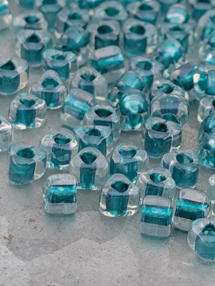 Crystal/Bright Green Inside Color Lined Sparkle Miyuki Triangle Size 5/0 (15g Pkg)