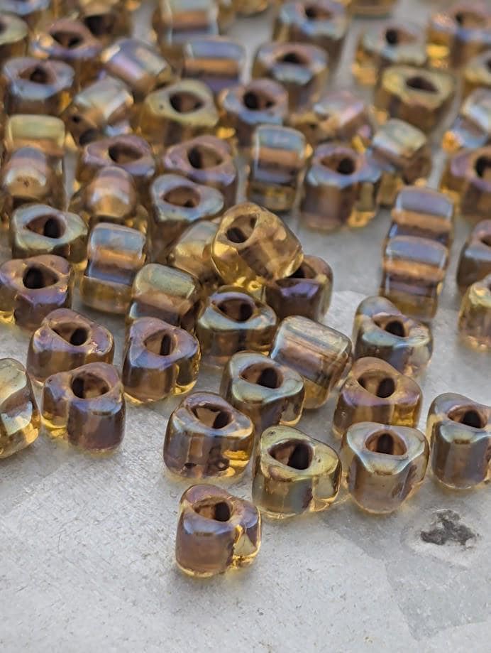 Amber/Brown Inside Color Lined Miyuki Triangle Size 5/0 (15g Pkg)