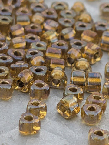 Peridot/Amber Inside Color Lined Sparkle Miyuki Triangle Size 8/0 (15g Pkg)