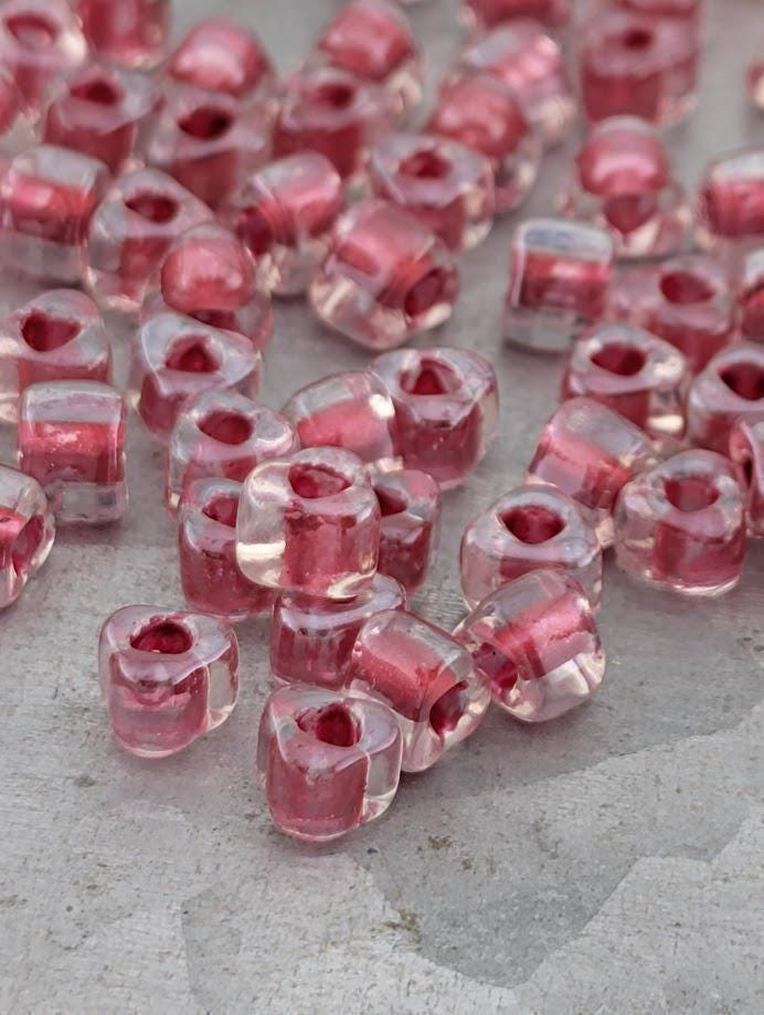 Crystal/Dark Rose Inside Color Lined Sparkle Miyuki Triangle Size 5/0 (15g Pkg)