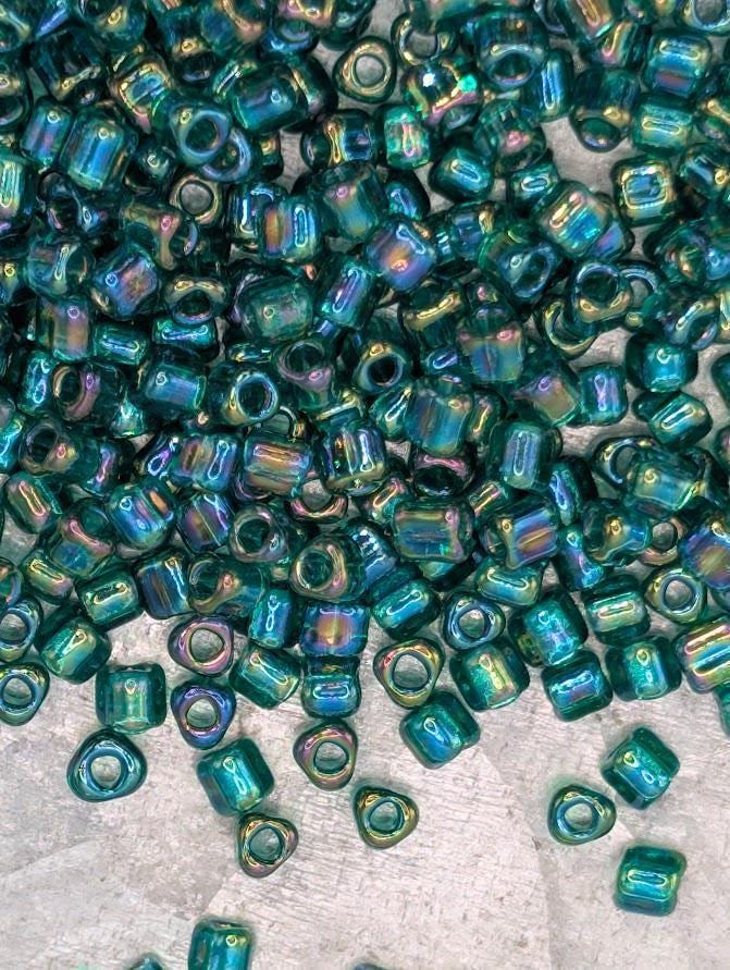 Medium Green Translucent Rainbow Miyuki Triangle Size 8/0 (15g Pkg)