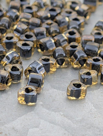 Amber/Black Inside Color Lined Miyuki Triangle Size 5/0 (15g Pkg)