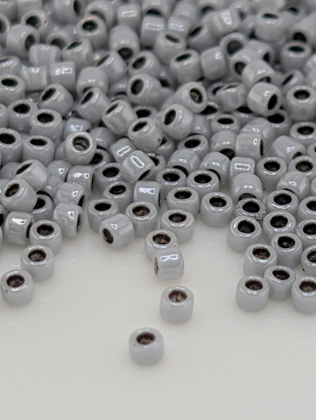 Inside-Color Opaque Gray/Black-Lined Size 15/0 Toho Round 2.5" tube