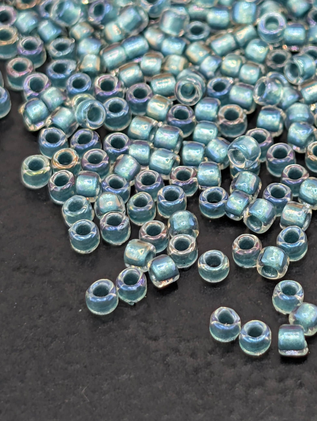 Inside-Color Rainbow Crystal/Teal-Lined Size 15/0 Toho Round 2.5" tube
