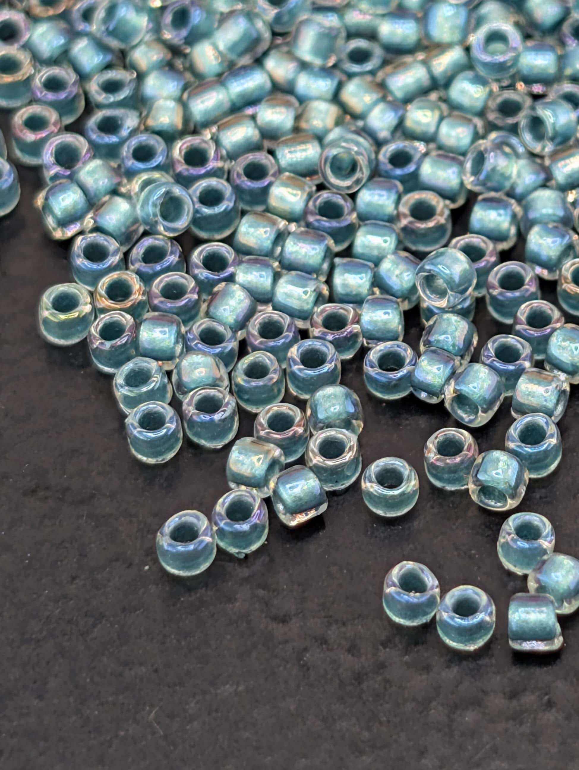 Inside-Color Rainbow Crystal/Teal-Lined Size 15/0 Toho Round 2.5" tube