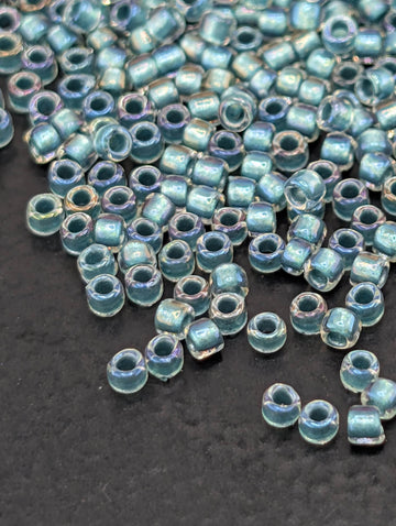 Inside-Color Rainbow Crystal/Teal-Lined Size 15/0 Toho Round 2.5" tube