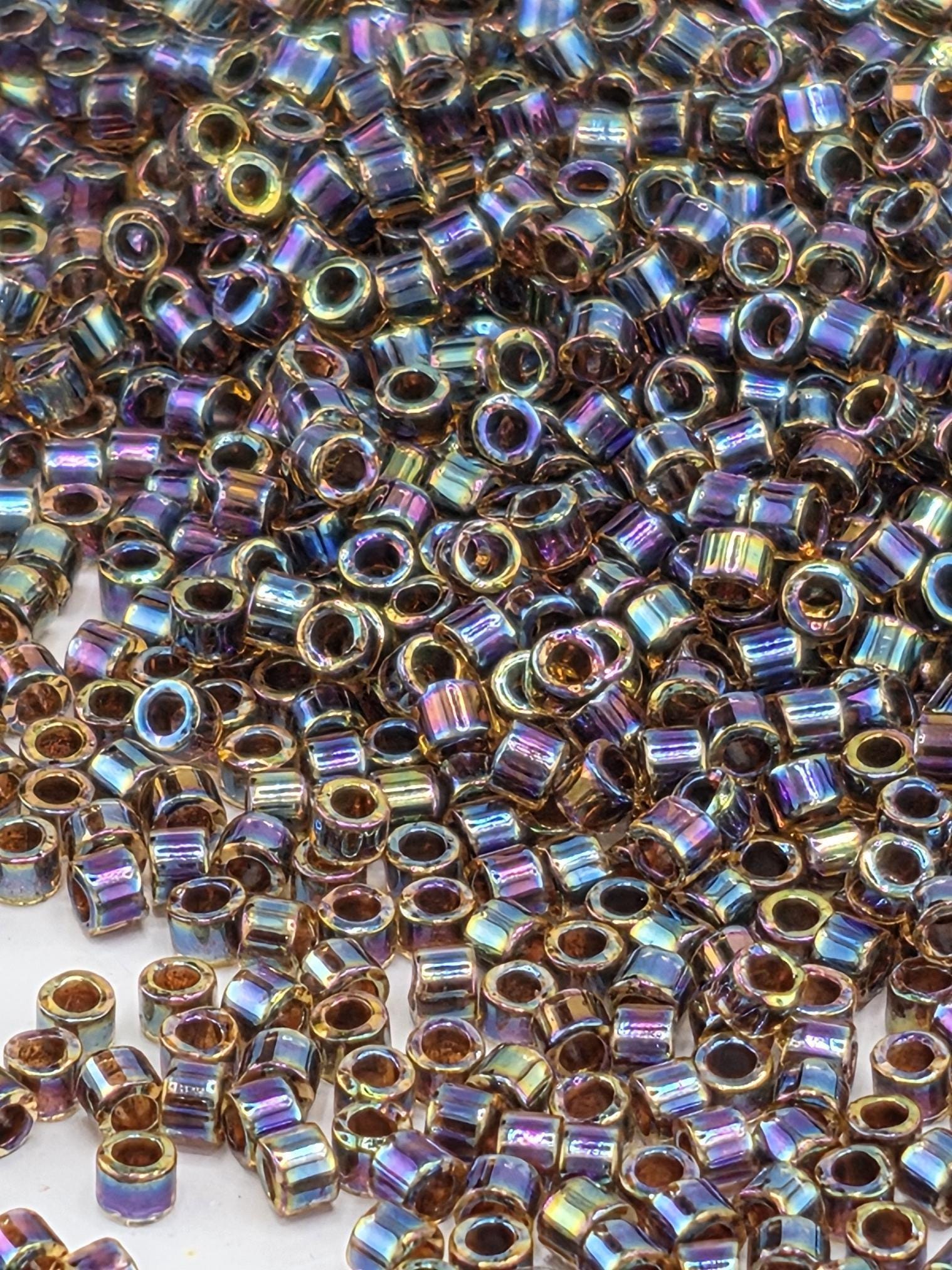 DB0087:Candle Lit/Amber Inside Color Lined Rainbow Miyuki Delica (Size 11, 7 grams, ~1400 beads)