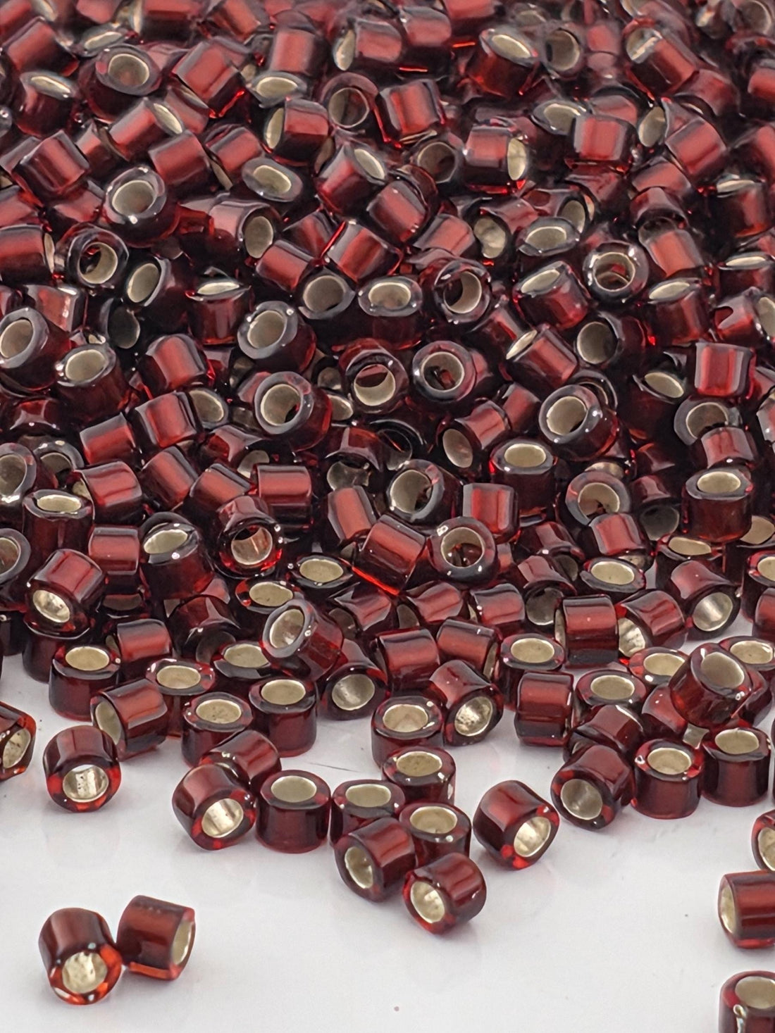 DB1685:Dark Garnet Red Translucent Silver-Lined Miyuki Delica (Size 11, 7 grams, ~1400 beads)