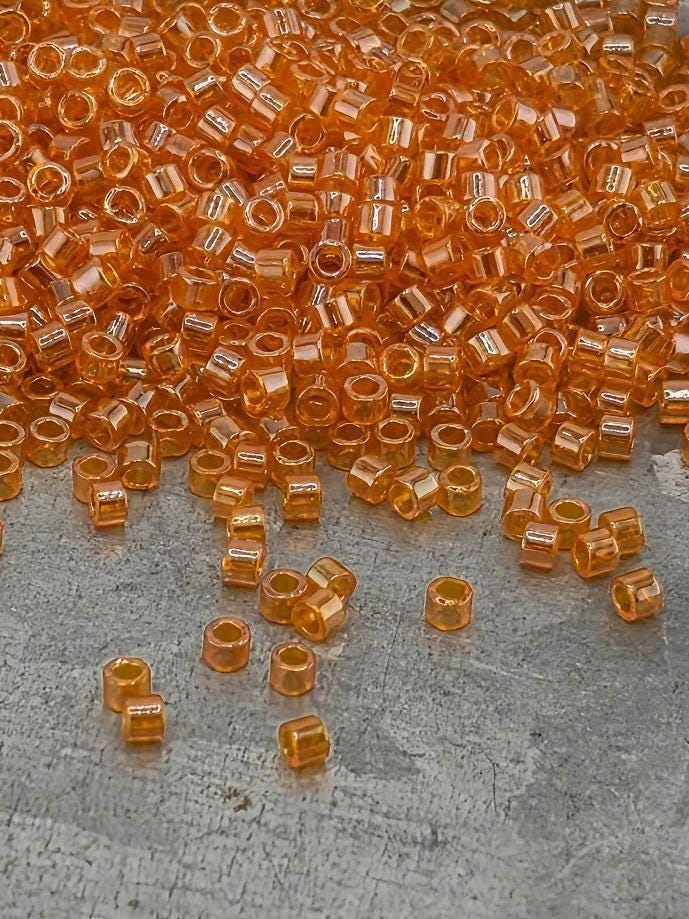 DB1887:Orange Grapefruit Translucent Inside Color Lined Miyuki Delica (Size 11, 7 grams, ~1400 beads)