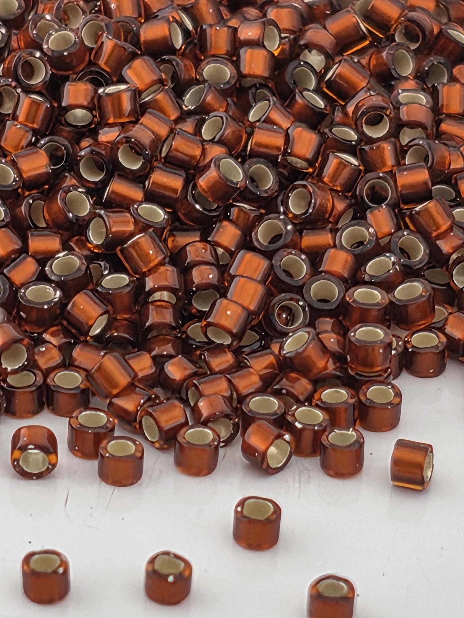 DB1683:Cinnamon Stick Translucent Silver-Lined Miyuki Delica (Size 11, 7 grams, ~1400 beads)