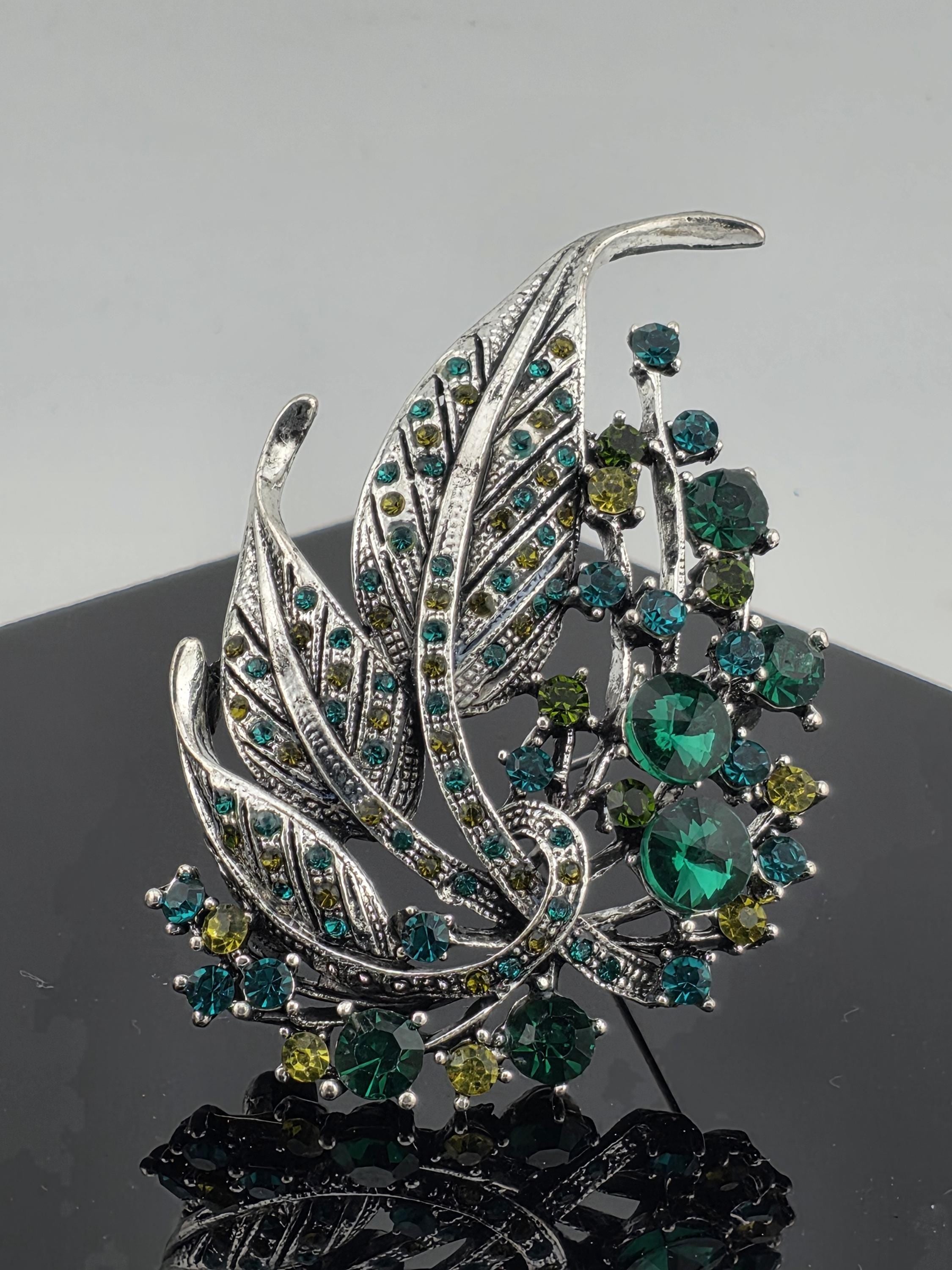 Silver Plated Feather Brooch: Blue Topaz and Emerald Rhinestone Pin