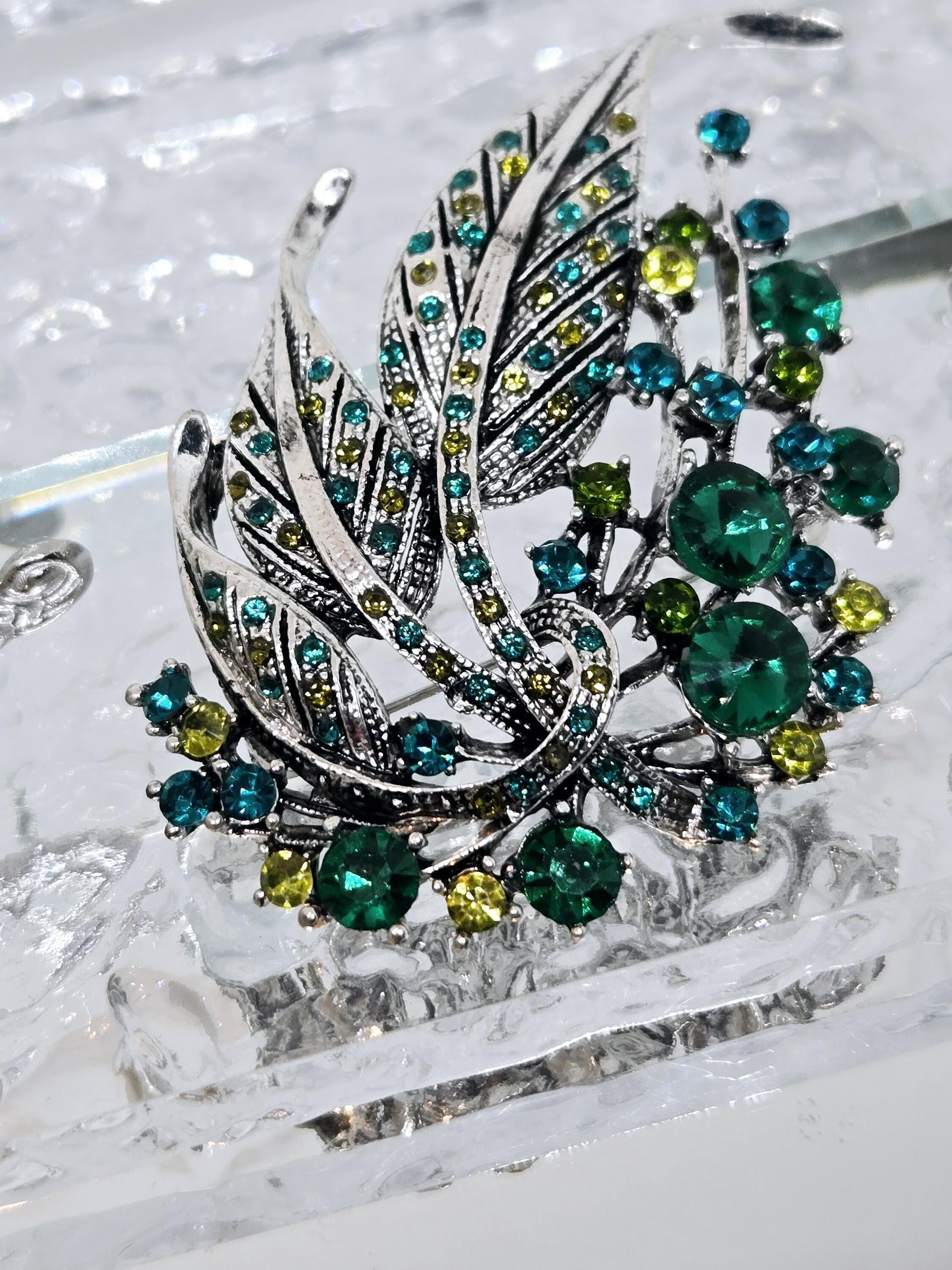 Silver Plated Feather Brooch: Blue Topaz and Emerald Rhinestone Pin