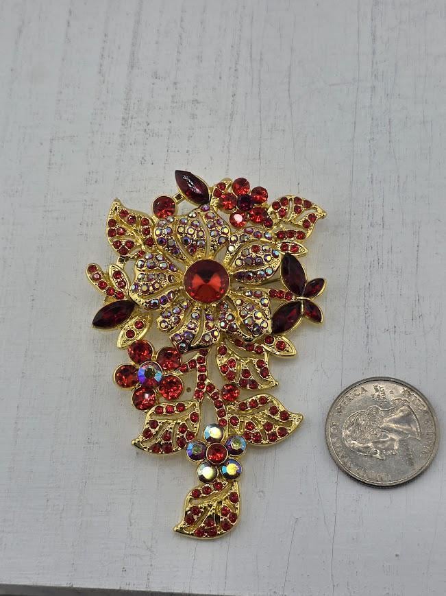 Ruby Flower Brooch: Gold Plated with Red Gemstone Accent