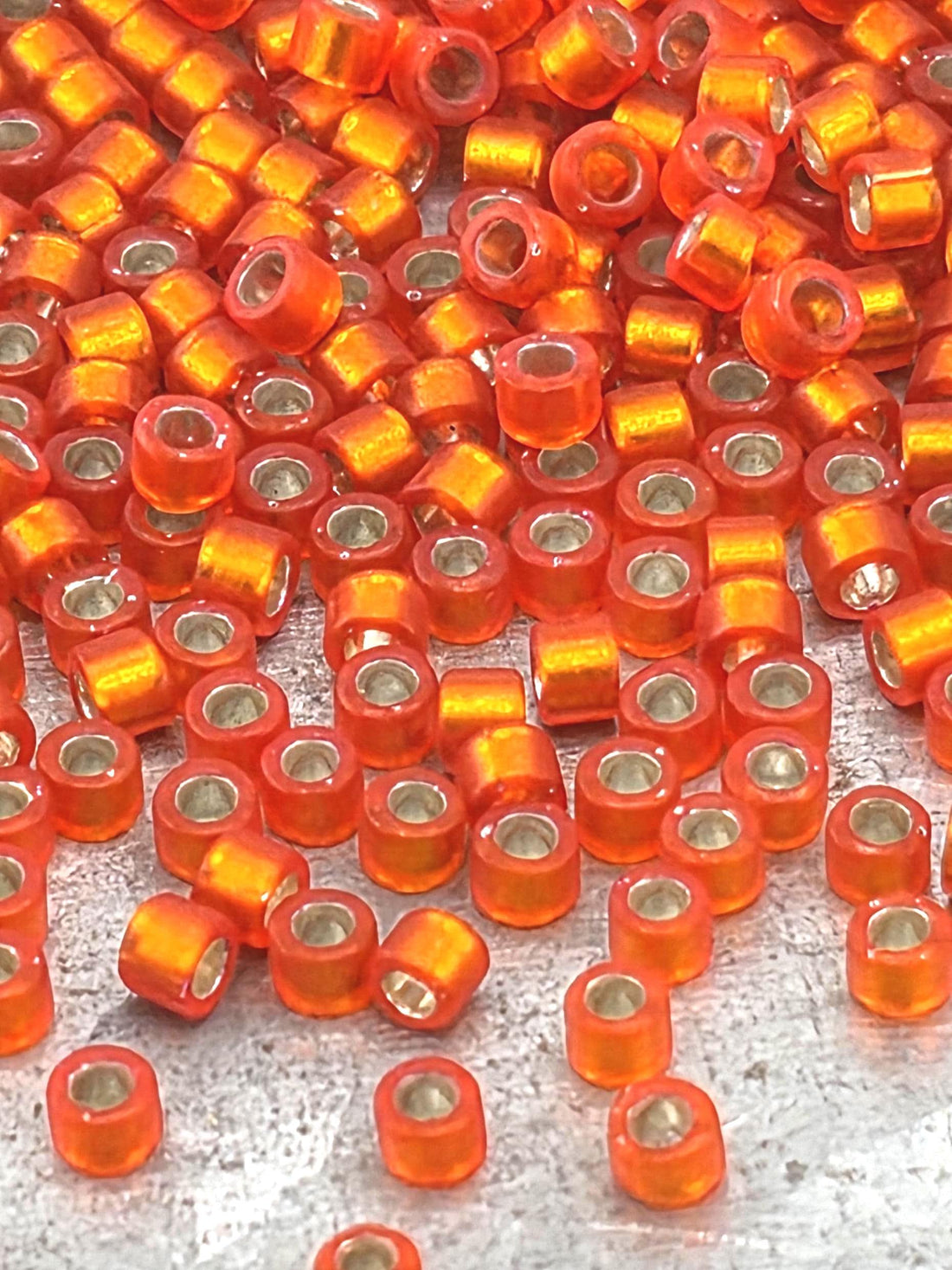 DB0682:Dark Orange Translucent Silver Lined Semi-Matte Duracoat Miyuki Delica (Size 11, 7 grams, ~1400 beads)