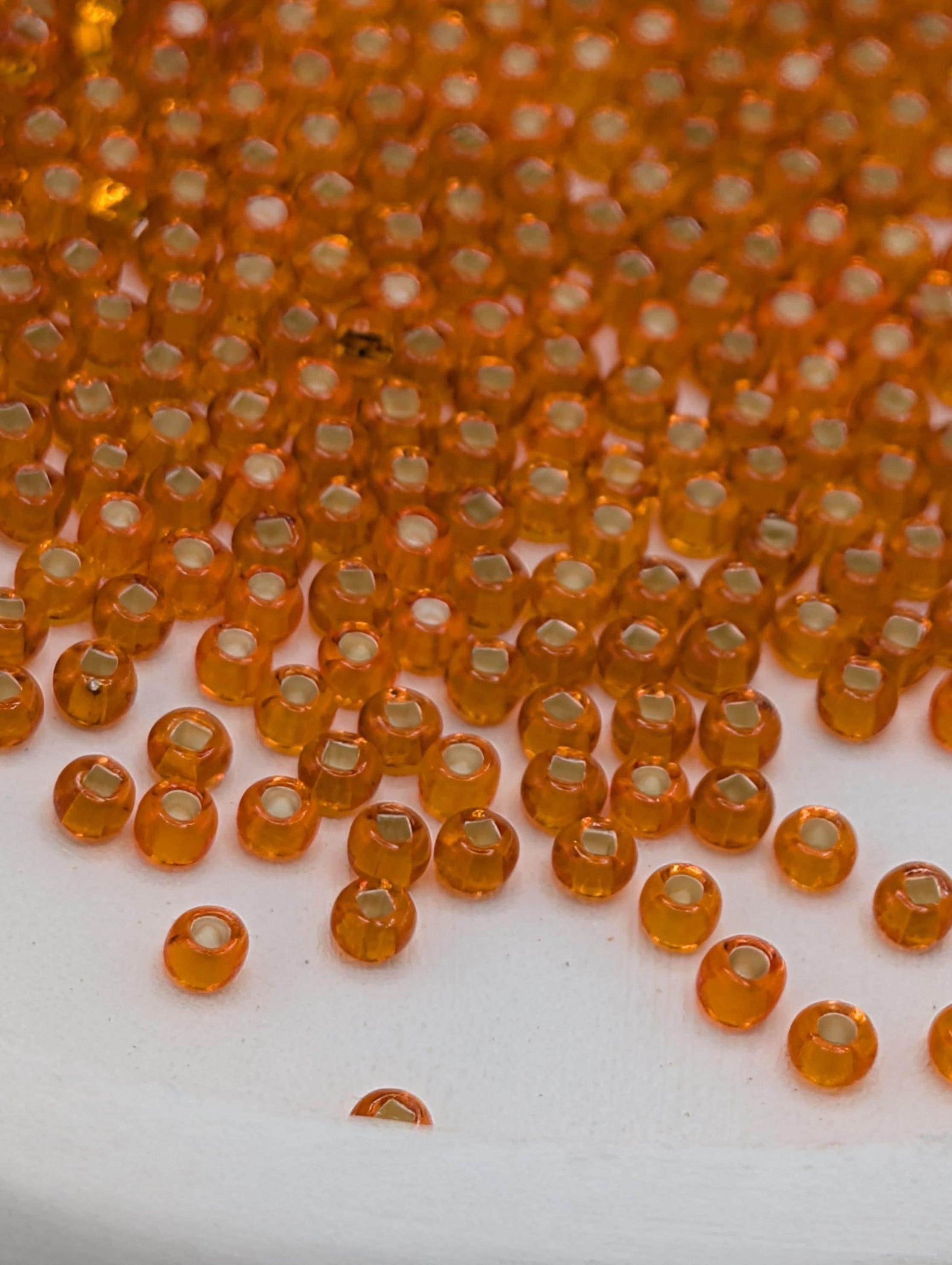 Transparent Silver Lined Orange | Size 11 | 15g | Preciosa-Ornela Glass Seed Beads