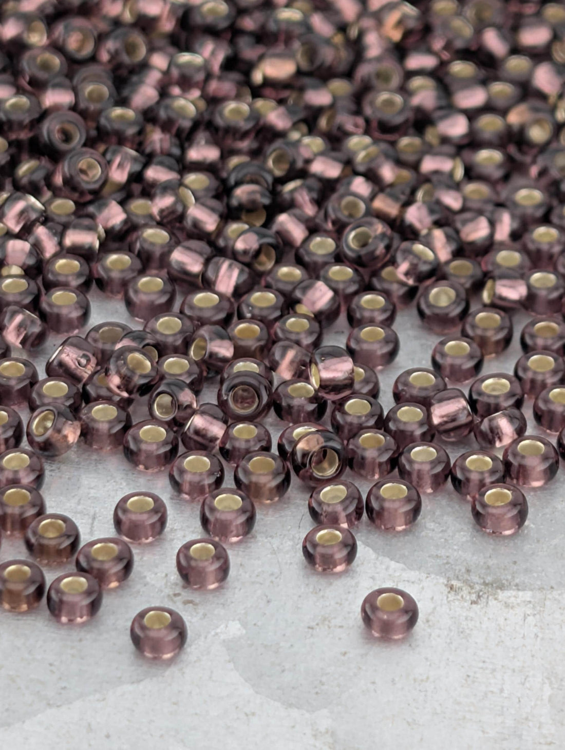 Transparent Amethyst Silver Lined | Size 8 | Half-Hank (12" 6-String) | Preciosa-Ornela Glass Seed Beads