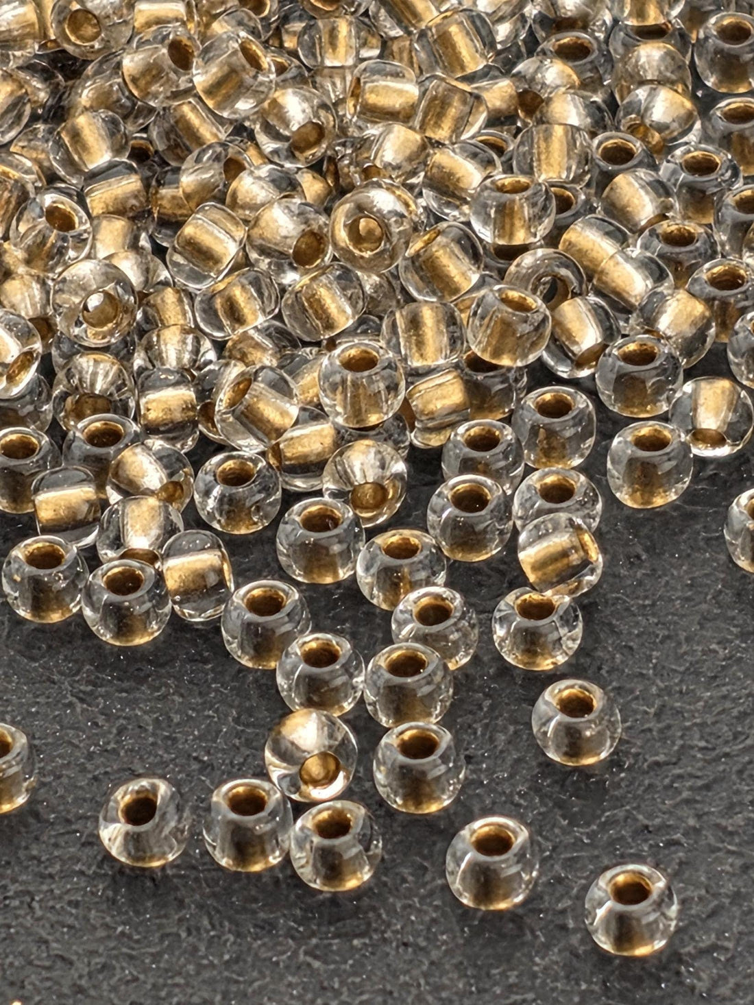 Transparent Bronze Lined Crystal | Size 8 | 15g | Preciosa-Ornela Glass Seed Beads