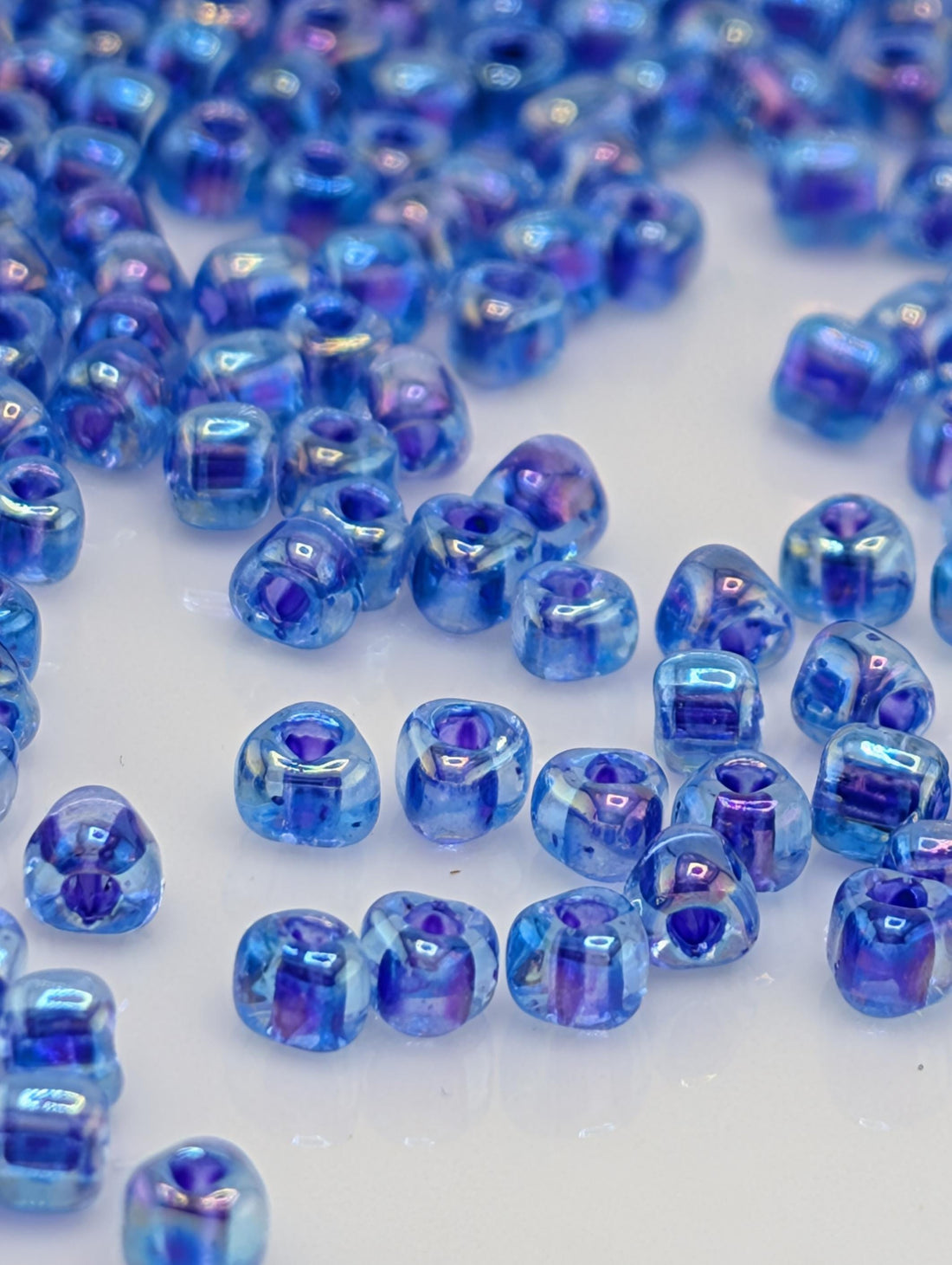 Lt Blue/Violet Inside Color Lined Miyuki Triangle Size 8/0 (15g Pkg)