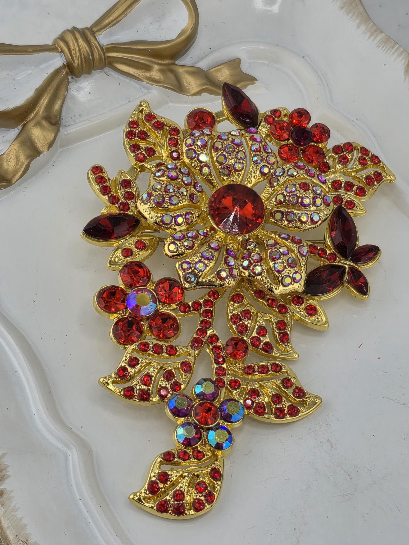 Ruby Flower Brooch: Gold Plated with Red Gemstone Accent