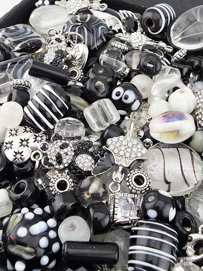 Whats Black and White and Just Rolled Under The Couch? Black and White Glass Beads - Matte Onyx, Crystals & Fun Charms