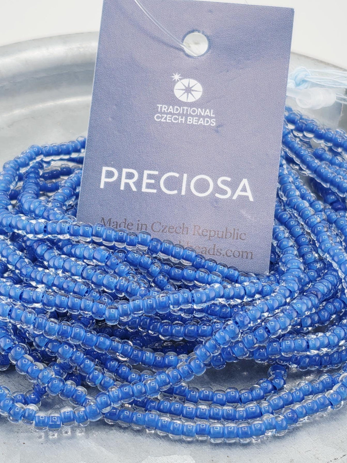 Transparent Terra Intensive Crystal Lined Blue | Size 8 | Half-Hank (12" 6-String) | Preciosa-Ornela Glass Seed Beads