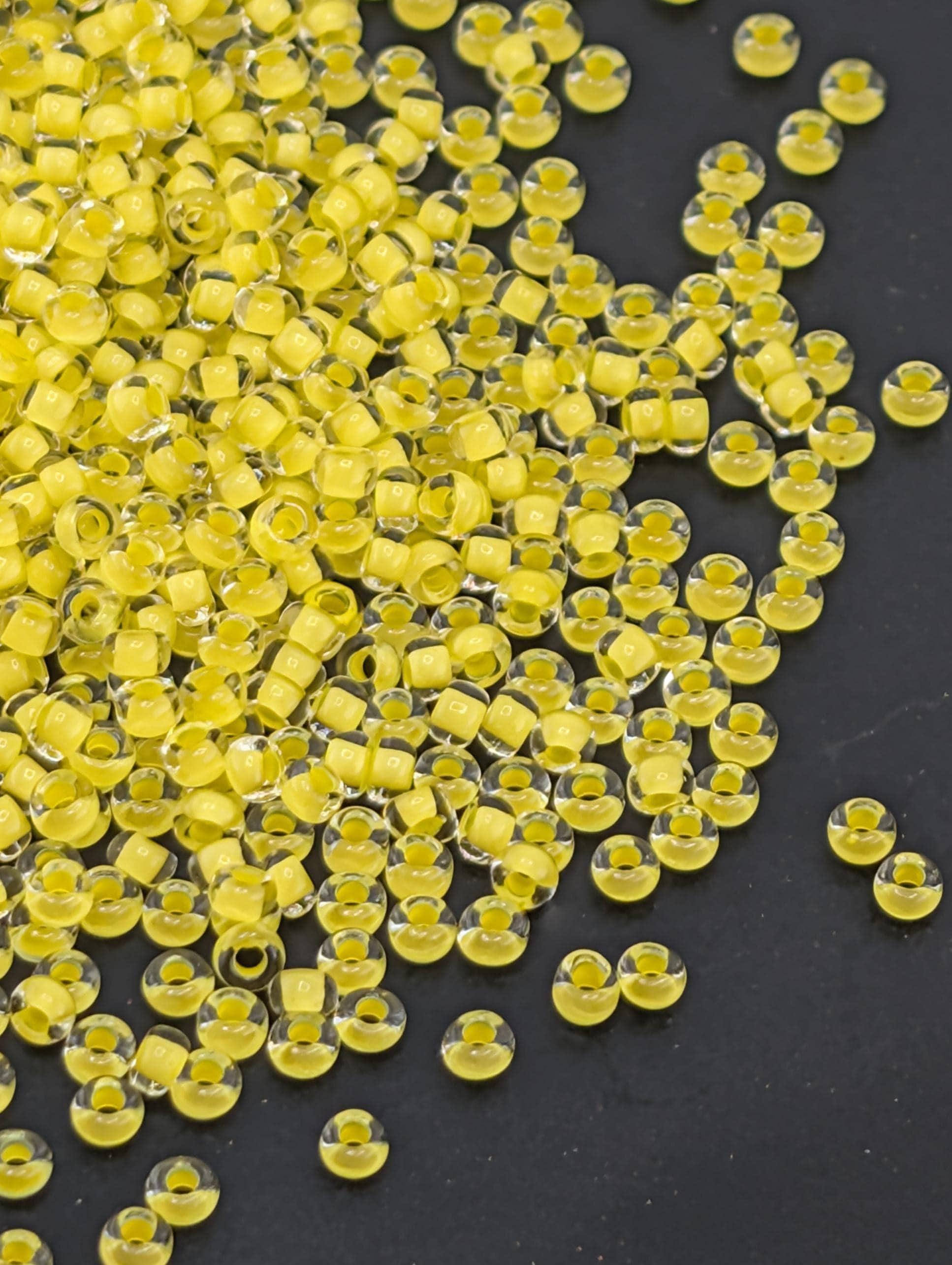 Transparent Terra Intensive YellowLined Clear | Size 11 | 15g Pkg | Preciosa-Ornela Glass Seed Beads | Czech Seed Beads