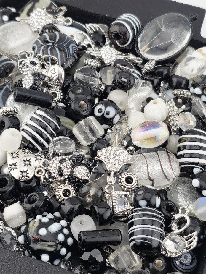 Whats Black and White and Just Rolled Under The Couch? Black and White Glass Beads - Matte Onyx, Crystals & Fun Charms
