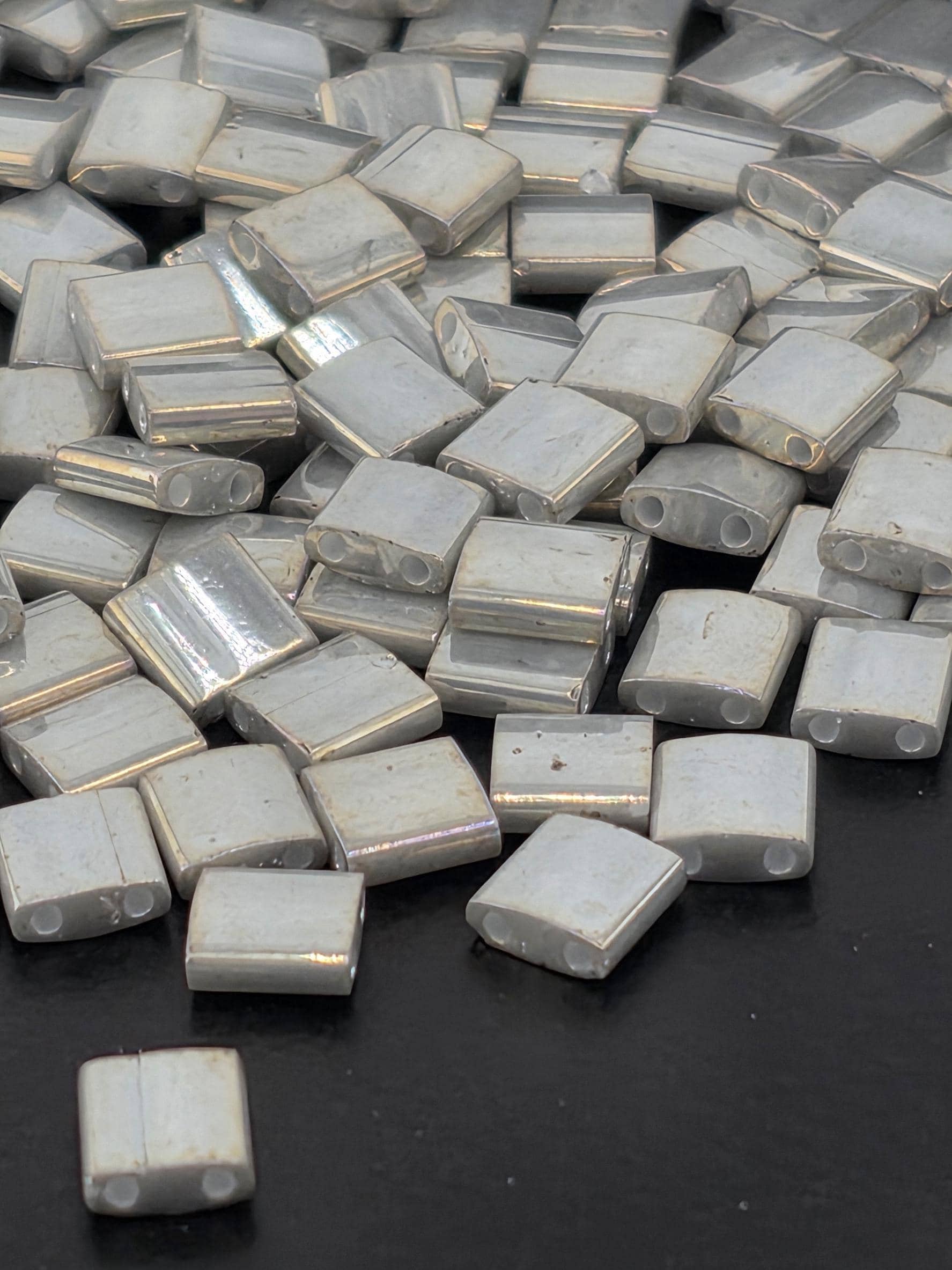 TL1865-Miyuki Tila Beads:Smoke Grey O/L (7.5g pkg)