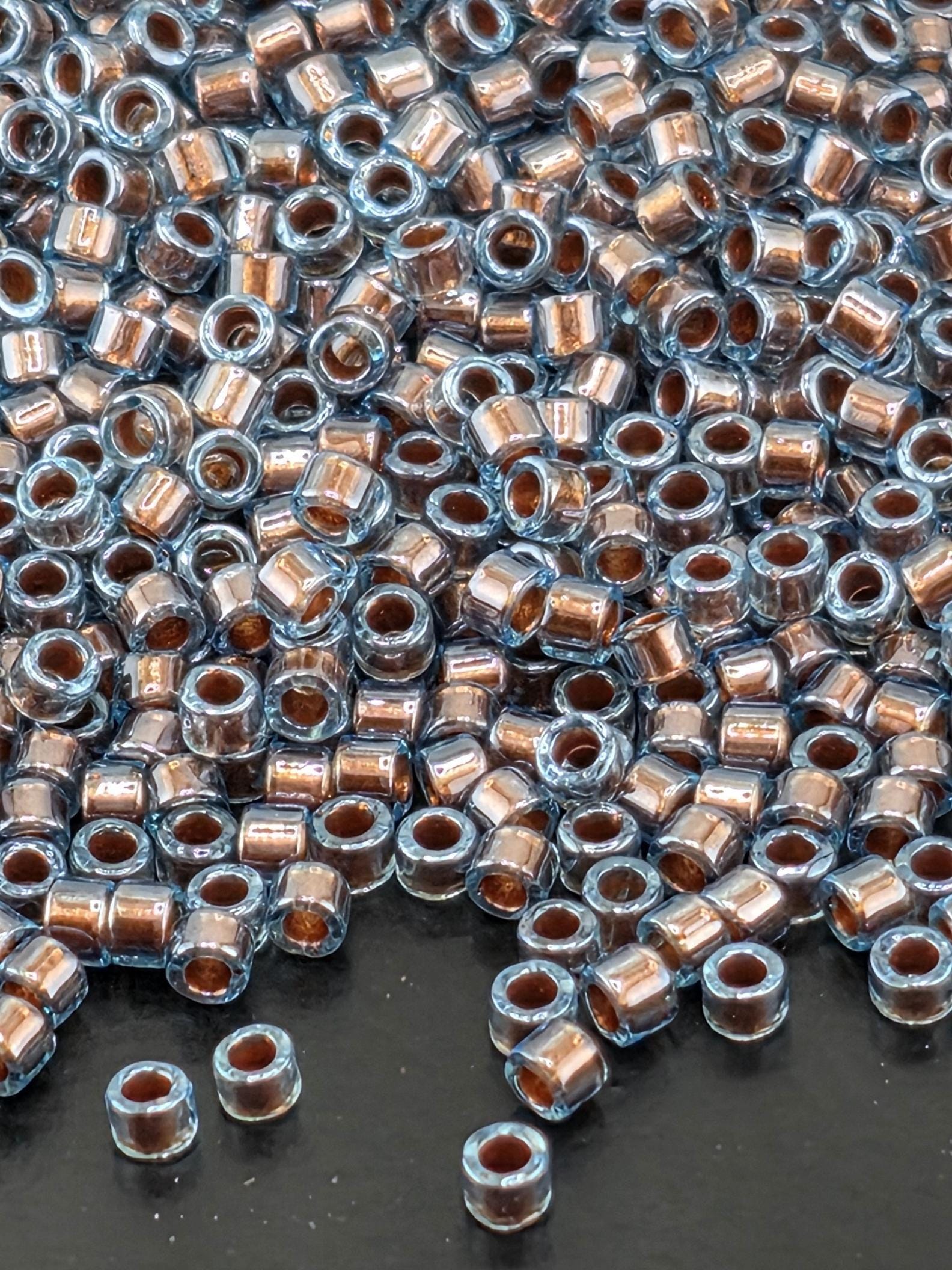 DB1706:Blue/Dark Copper Translucent Inside Color Lined Pearl | Size 11/0 | 7g