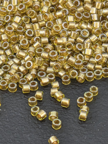 DB0909:Lt Chartreuse/Amber Inside Color Lined Sparkle Duracoat | Size 11/0 | 7g