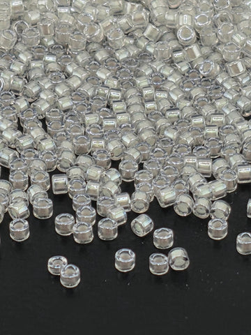 DB1701:Crystal/Candle Lit Translucent Inside Color Lined Pearl | Size 11/0 | 7g